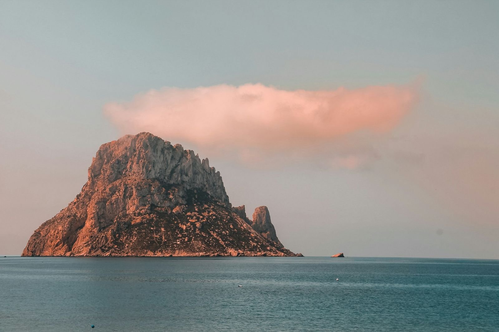 Es Vedrà rising from the sea off Ibiza